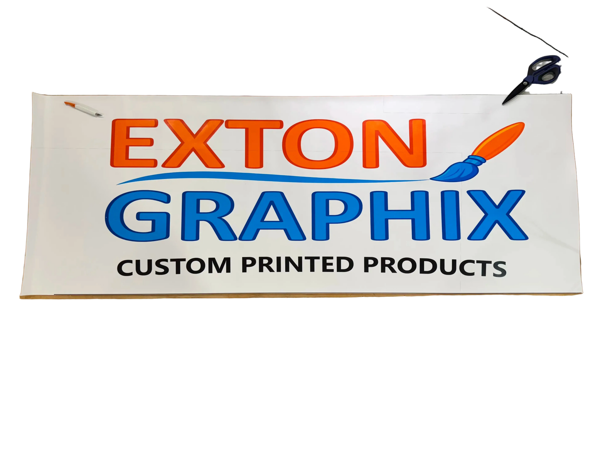 exton graphix banner on table